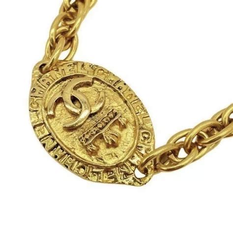 gold coco chanel necklace|Chanel coco mark necklace.